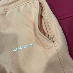 Women’s Alphalete size Smalll Orange Frost NWOT